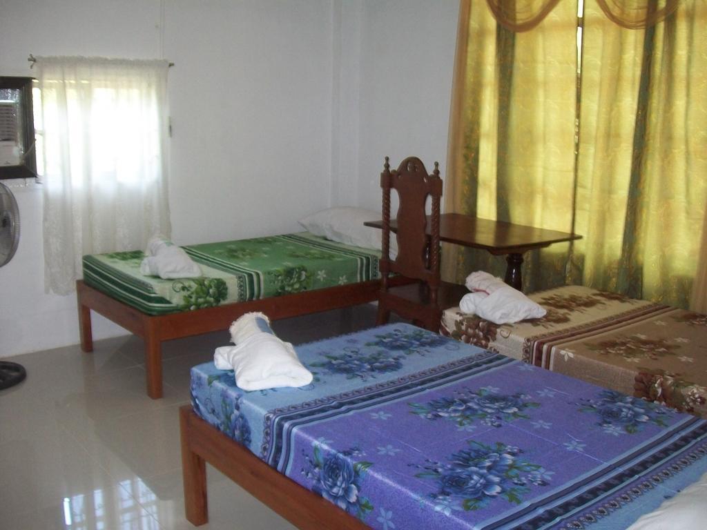 Charm Guest House بويرتو برينسيسا الغرفة الصورة